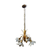 Brass chandelier and flowers in mother-of-pearl petals
