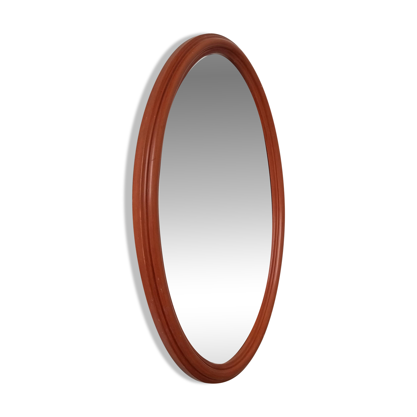 Vintage oval wooden mirror "caramel" from the 1960s.