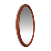 Vintage oval wooden mirror "caramel" from the 1960s.