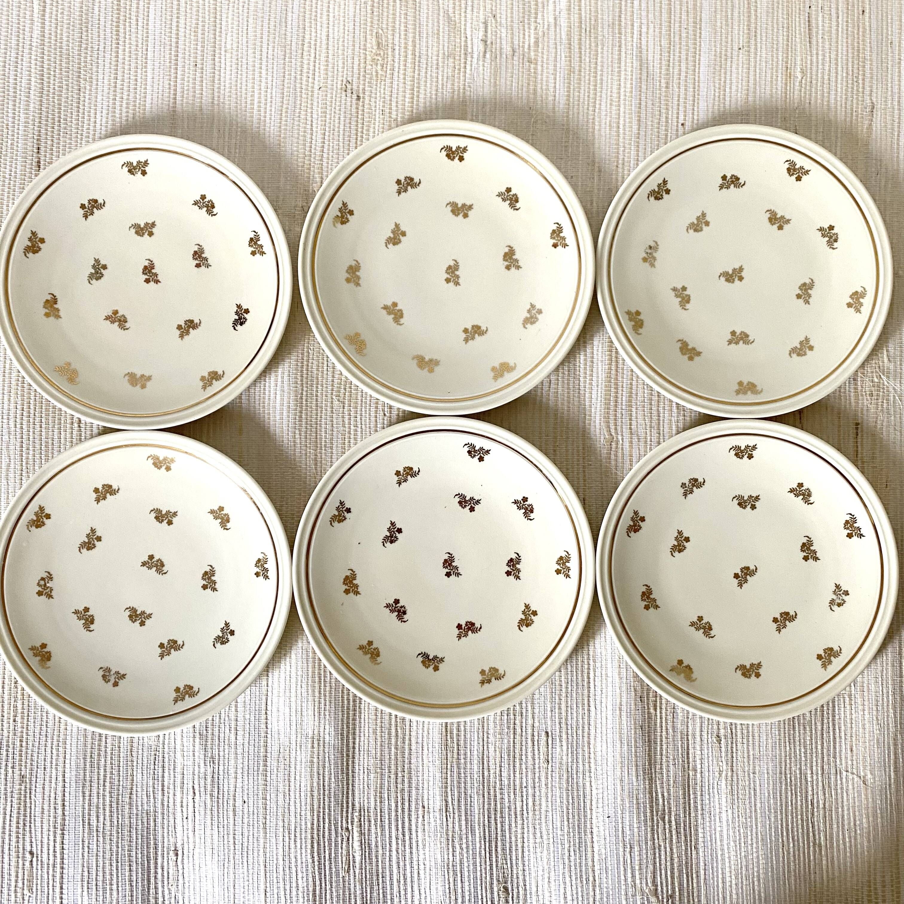 Cream and gold Limoges porcelain dessert plates