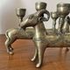 Pair of religious silver-plated zoomorphic candlesticks