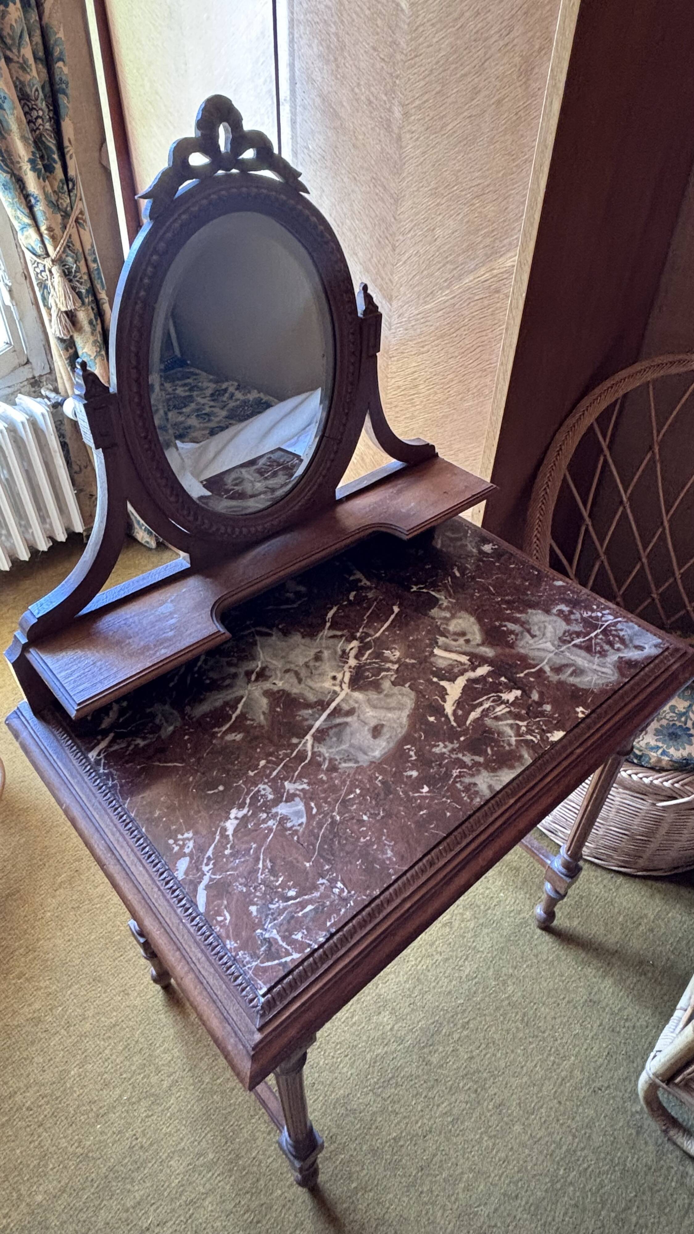 Antique oak and red marble dressing table with a swivel mirror.