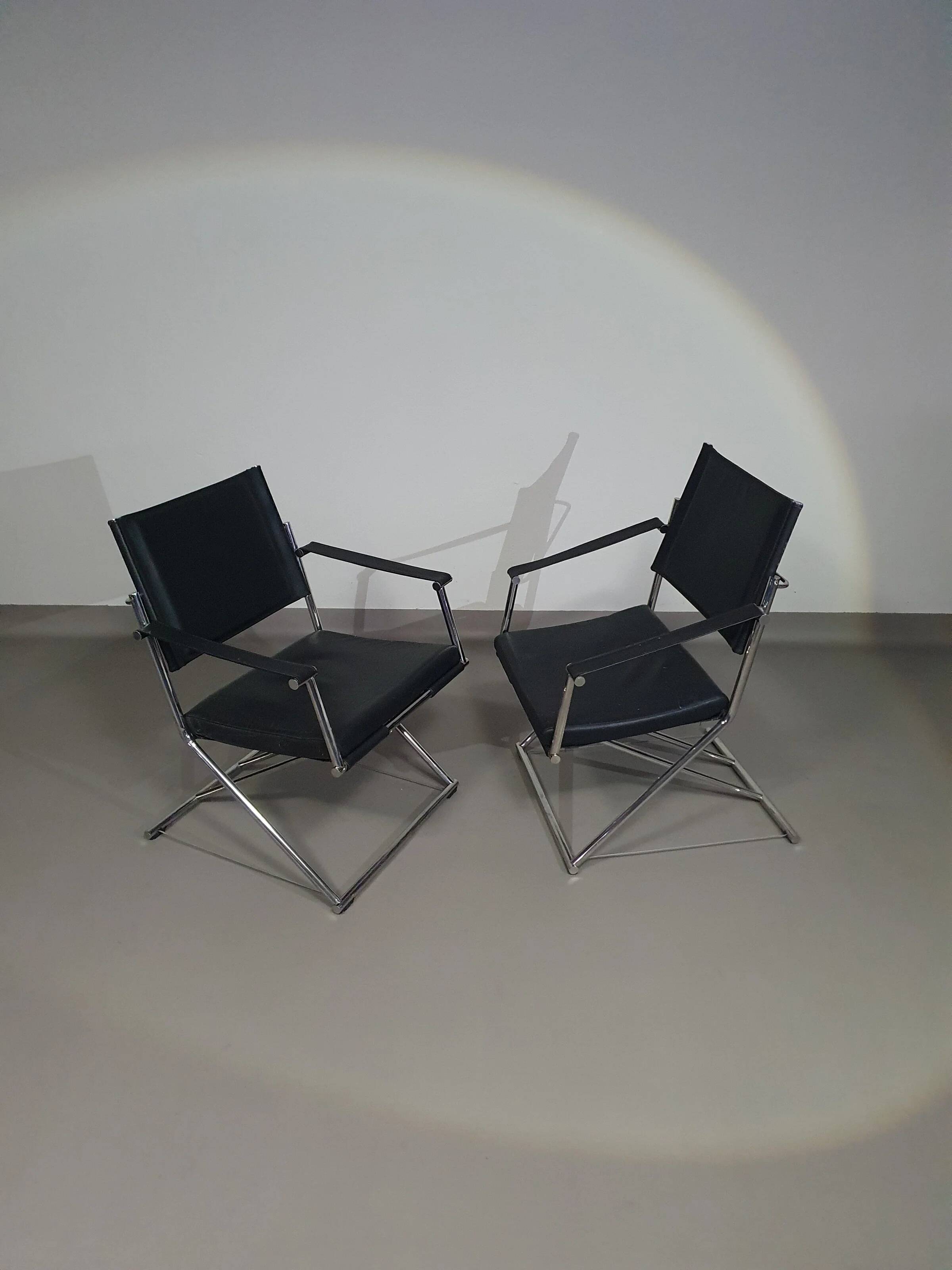 2 leather chrome folding chairs