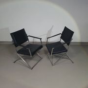 2 chaises pliantes en cuir chromé