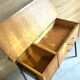 Vintage 1950s sewing machine with blonde oak veneer.