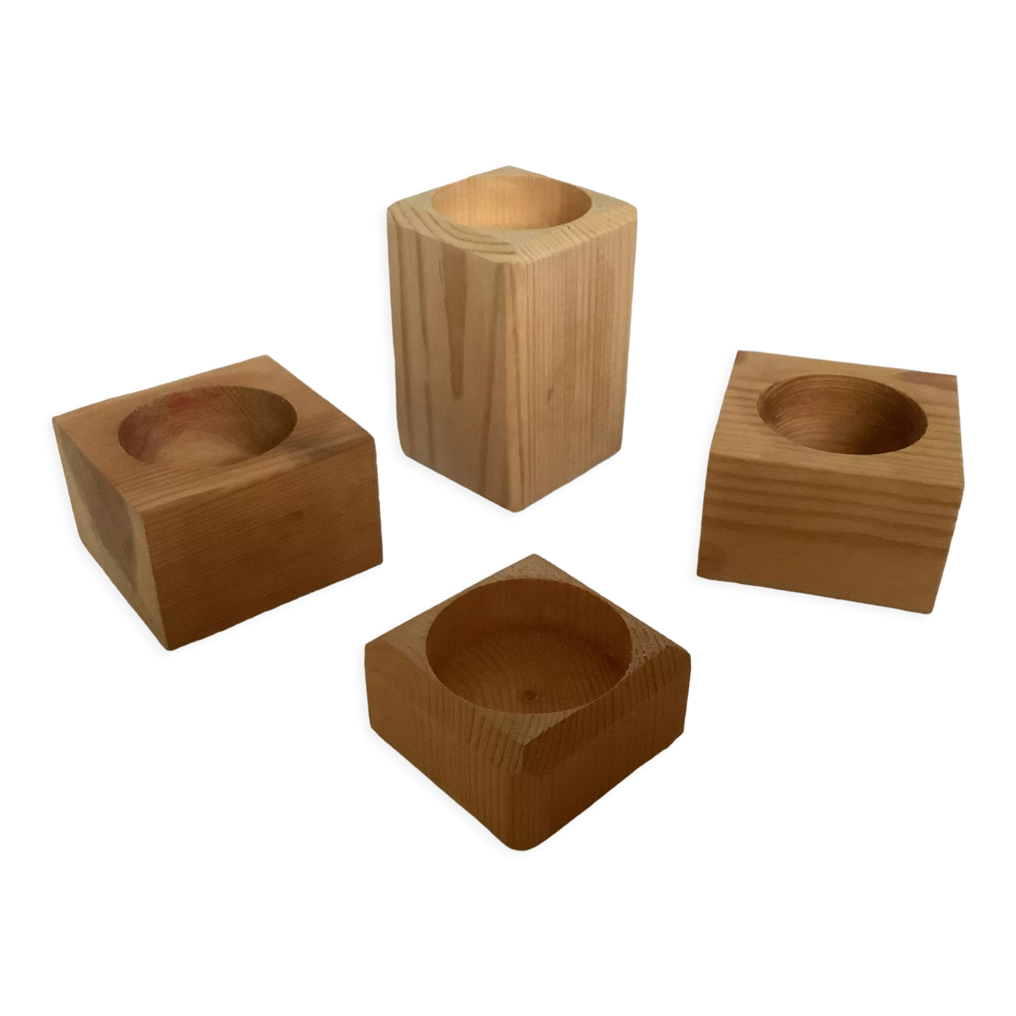 Set of four scandinavian wooden candle holders