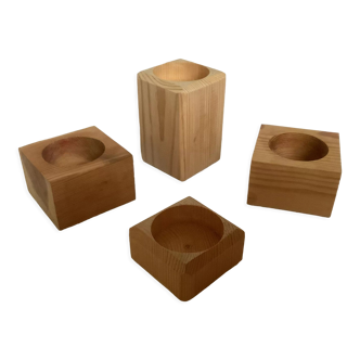 Set of four scandinavian wooden candle holders