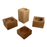 Set of four scandinavian wooden candle holders