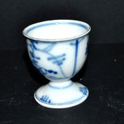 Antique porcelain diabolo egg cup with blue hand-painted onion decoration