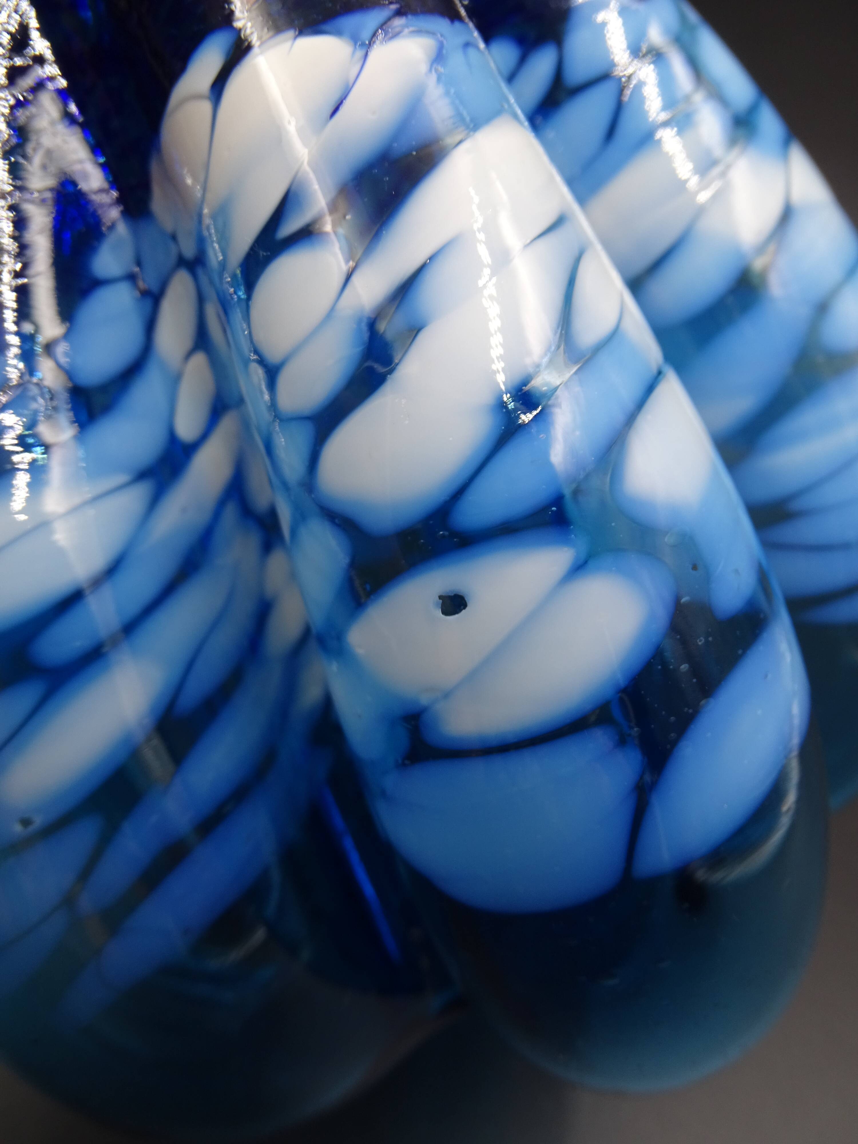 Blue glass vase and touches of white