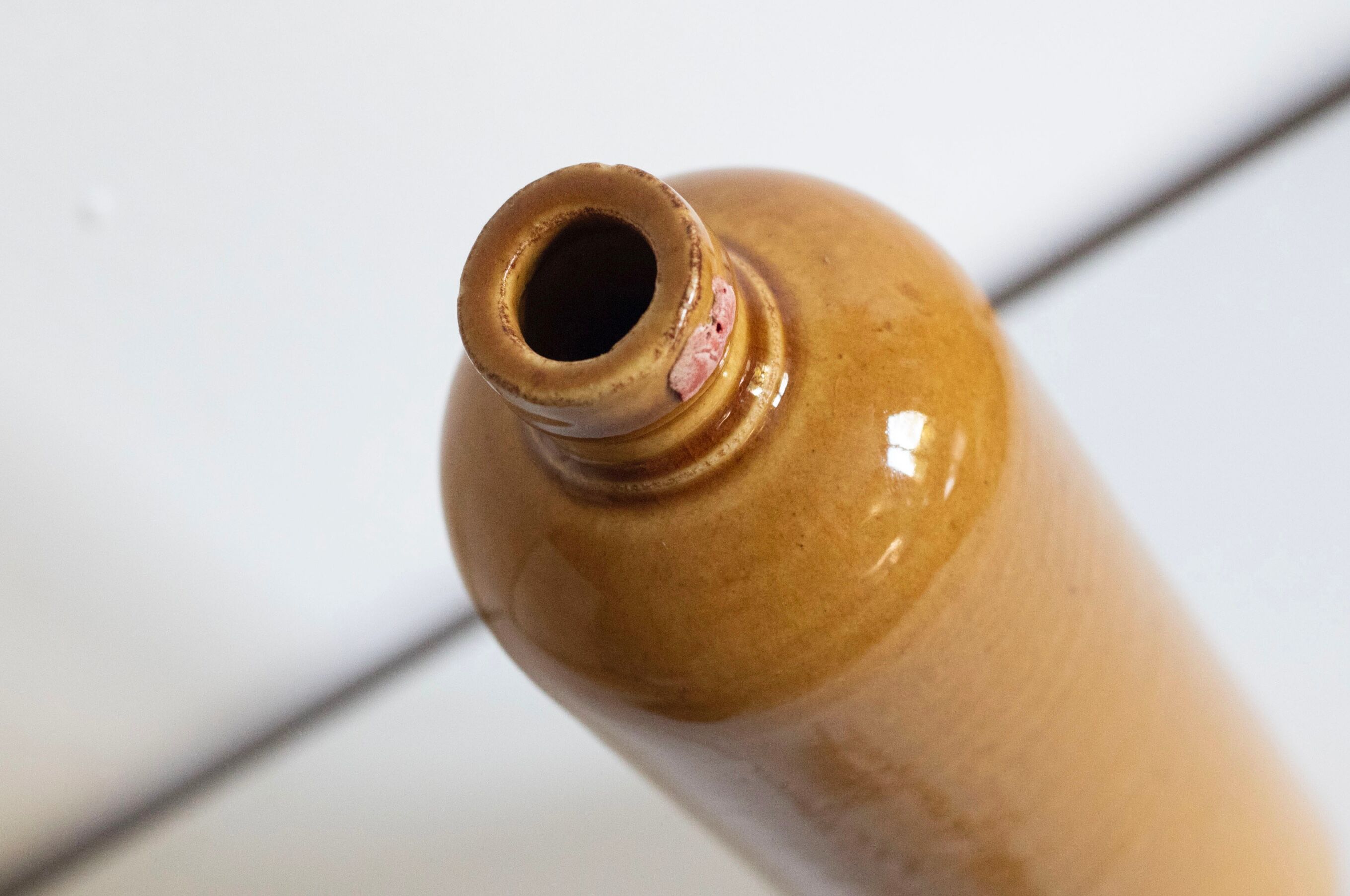 Enamelled stoneware bottle