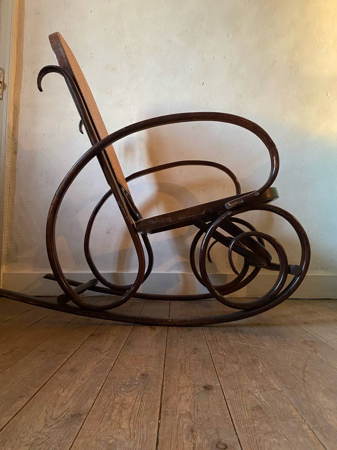 Wood and cane rocking chair