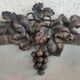 Old trumeau wrought iron decoration bunches grapes