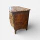 Louis XV period commode with violet wood veneer.