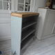 Vintage bookcase green of gray wooden top