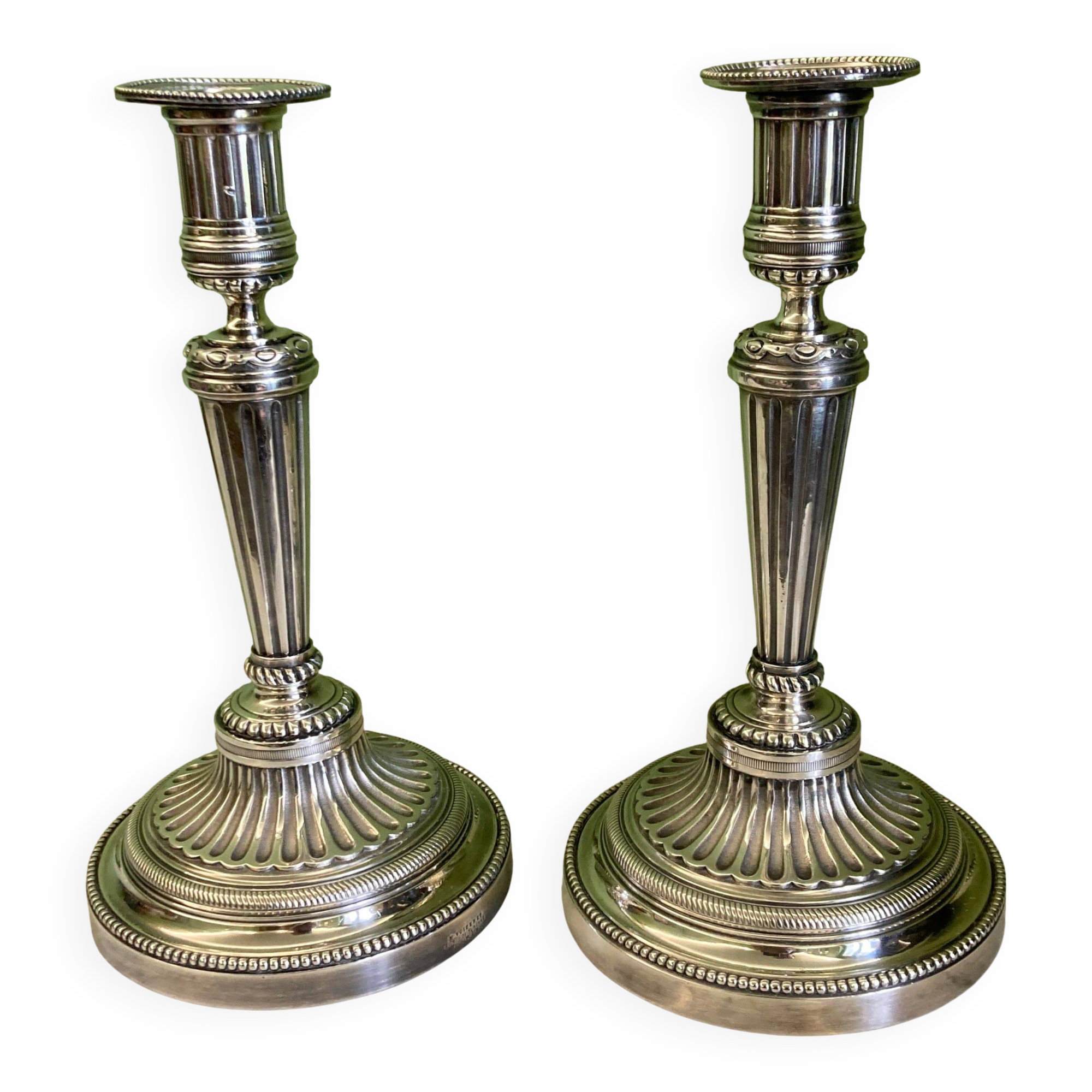 Pair of silvered bronze candlesticks from the 19th century in Louis XVI style signed Voisenet.