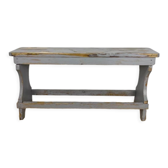 Old farmhouse bench in painted wood