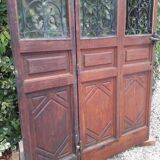 Porte d’entrée vitrée en chêne et grilles en fer, XIXème s.