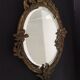 Art Deco hand-facing mirror in bronze and beveled ice