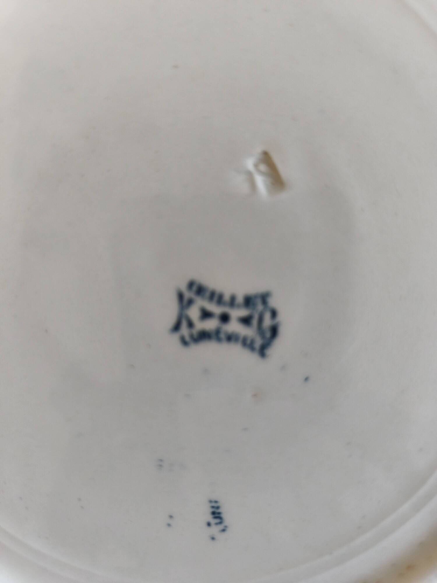 Two ironstone plates from Lunéville Keller and Guérin with a floral pattern.