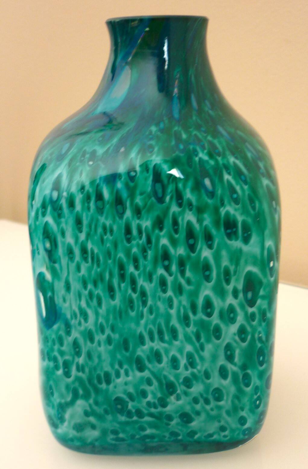 White multi-layer blown glass bottle vase with blue and green inclusions