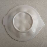 Vintage oyster plates in the shape of a sole.