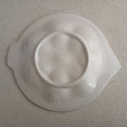 Vintage oyster plates in the shape of a sole.