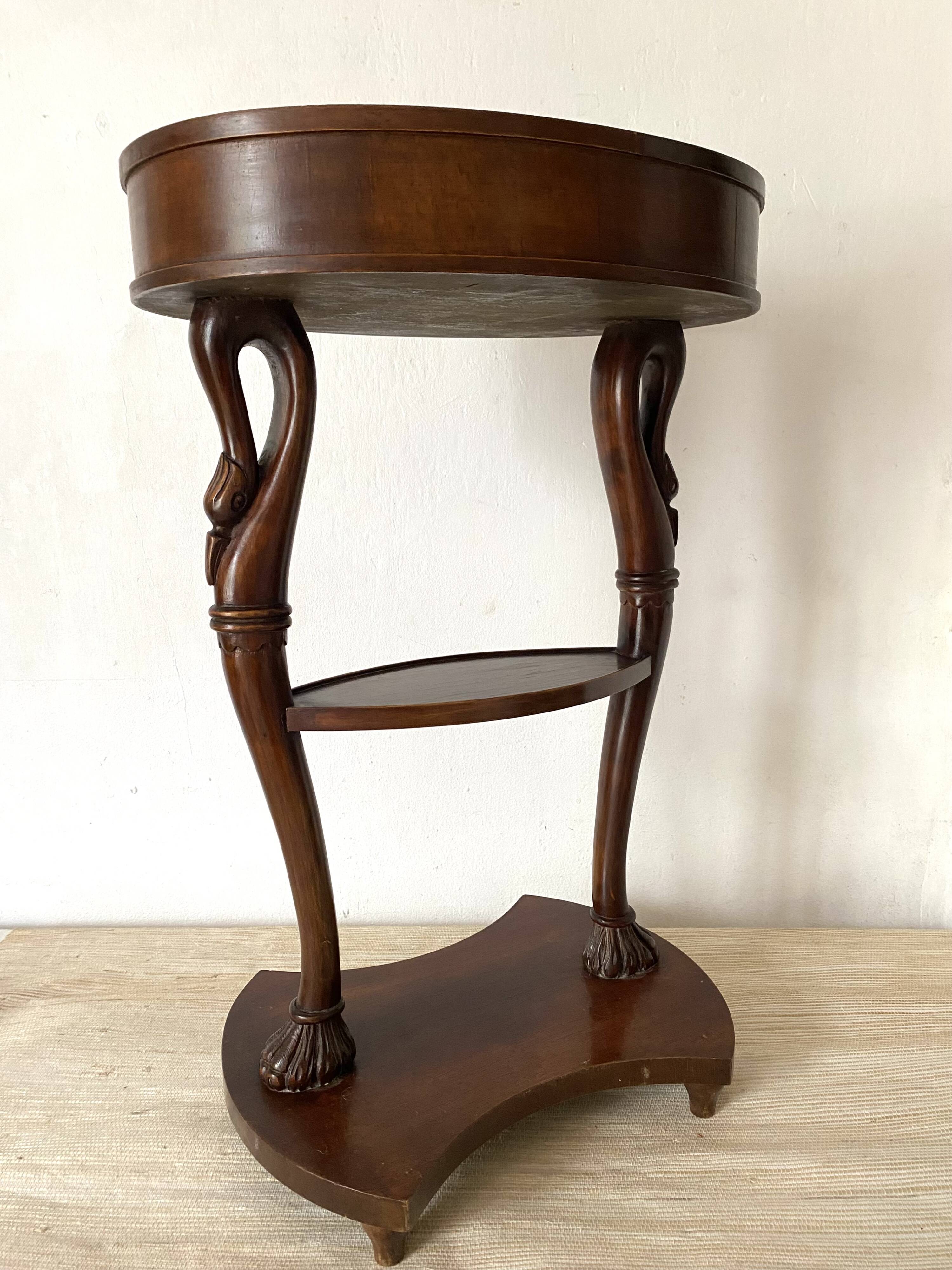 Empire style swan neck and lion paw pedestal table