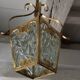 Glass and brass suspension