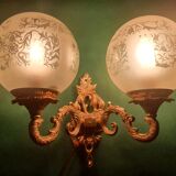 Pair of large double-light wall sconces in vintage brass and glass
