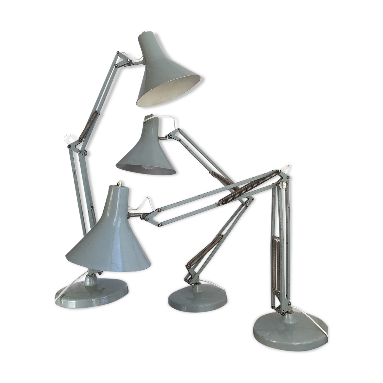 Three articulated lamps on Luxo base