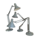 Three articulated lamps on Luxo base