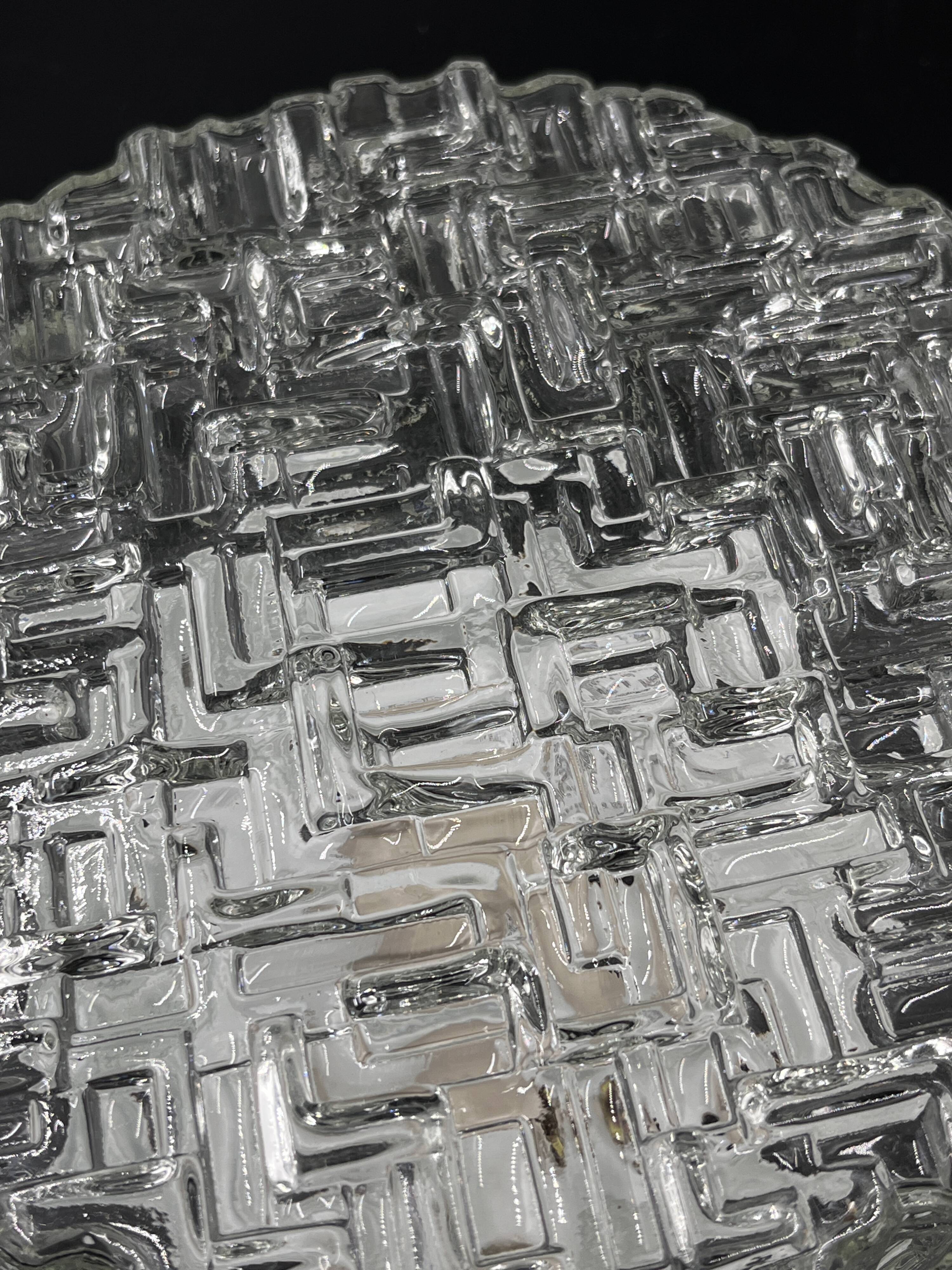 Molded glass ceiling light with relief