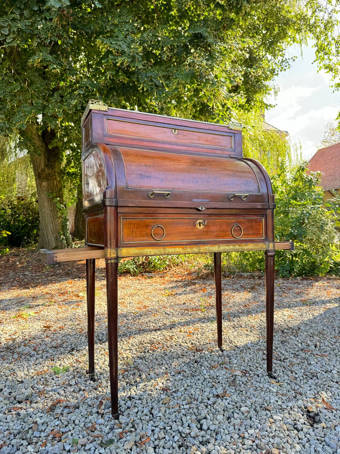 Elegant and rare Louis XVI period mahogany cylinder desk