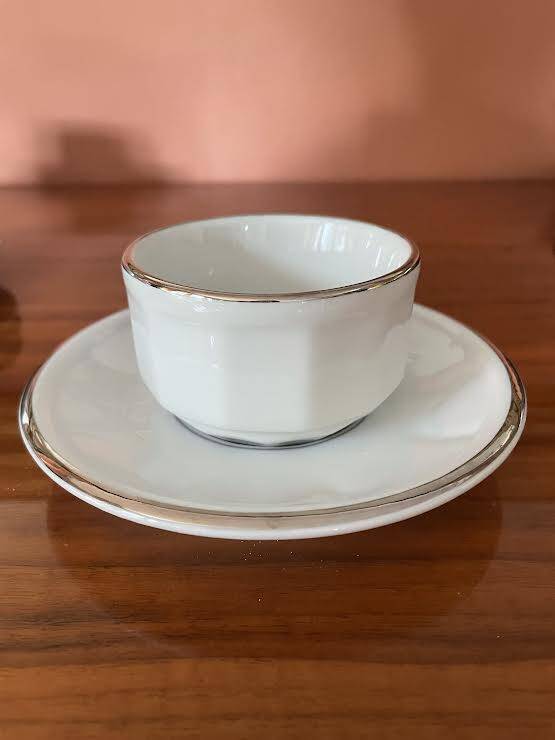 Four porcelain "bistro" cups and saucers