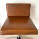 Vintage industrial office chair in skaï