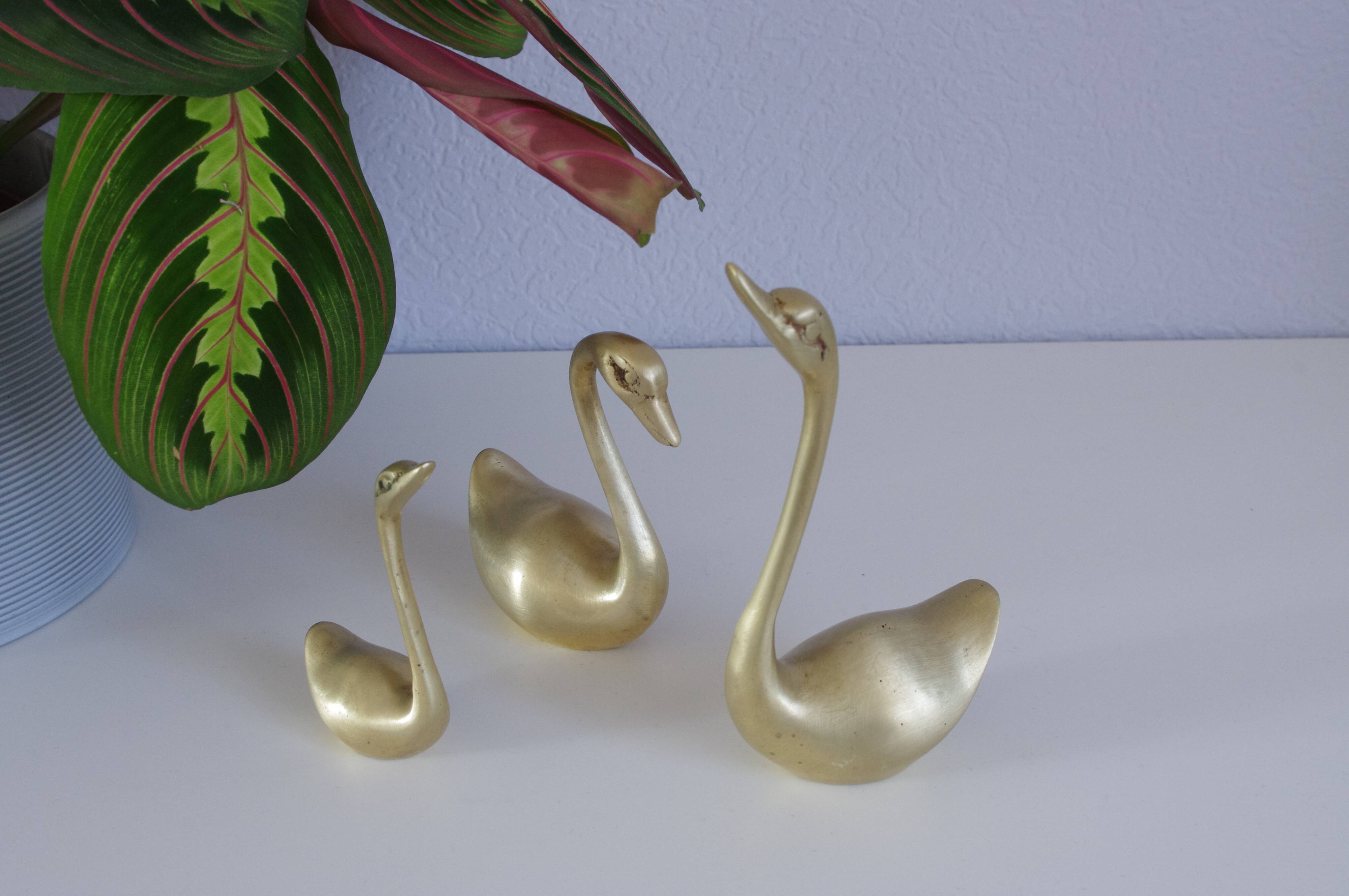 Swans or ducks brass