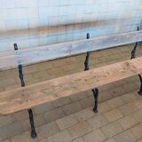 Antique garden bench with cast iron legs