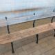 Antique garden bench with cast iron legs