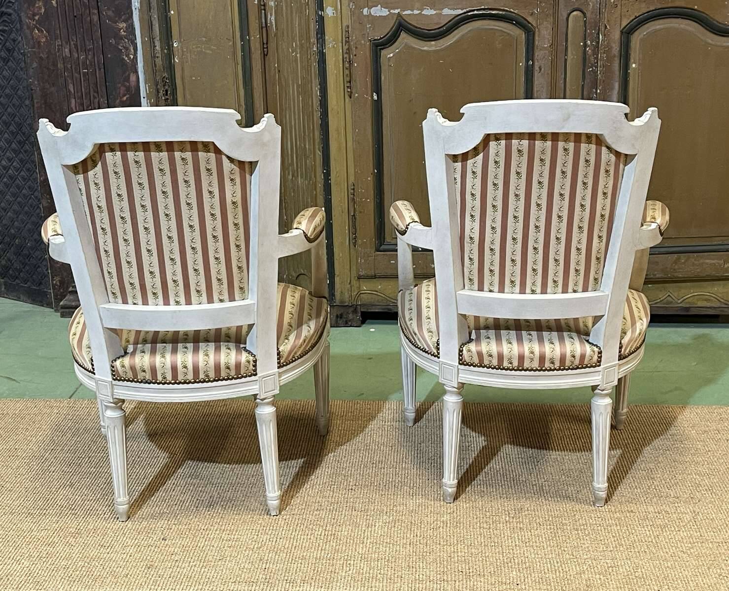 Pair of Louis XV style armchairs from the 1970s in beech.
