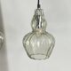 Pair of vintage glass pendant lights.