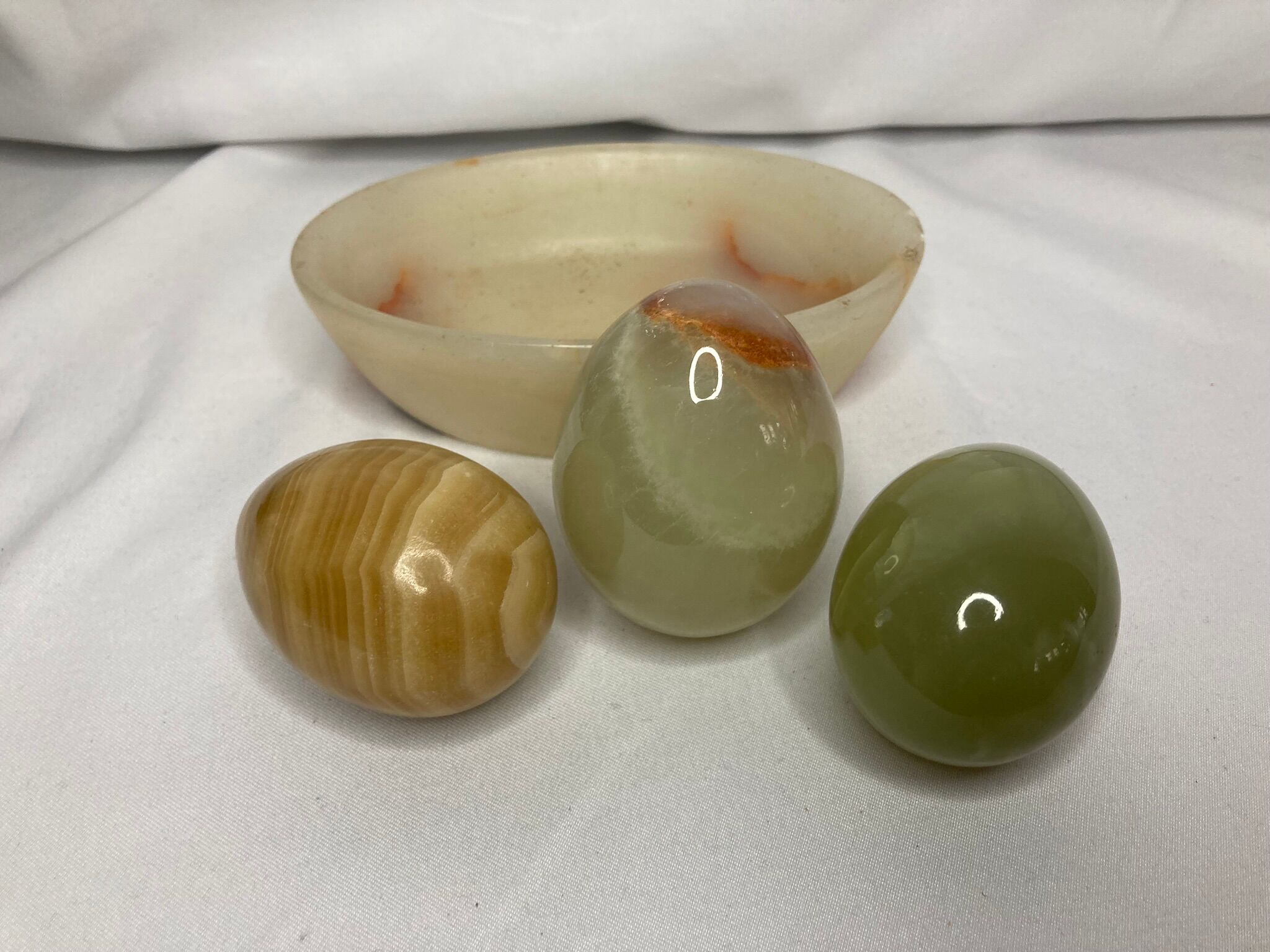 Series of three onyx eggs and XXth cup