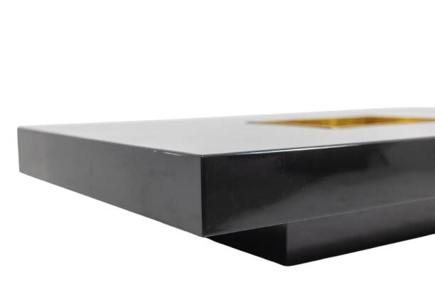 Willy Rizzo. Low table in black lacquered wood and gold brass. 1970s.