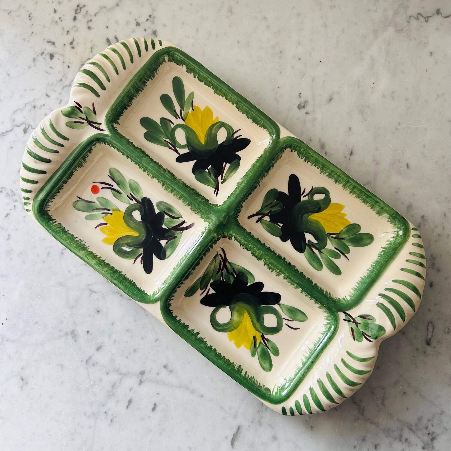 Serving dish with floral decoration signed