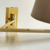 articulated brass and velvet wall light