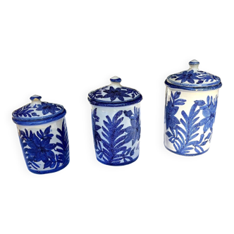 Three small blue pots