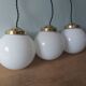 Lot de 3 suspensions art deco avec globe en opaline blanche