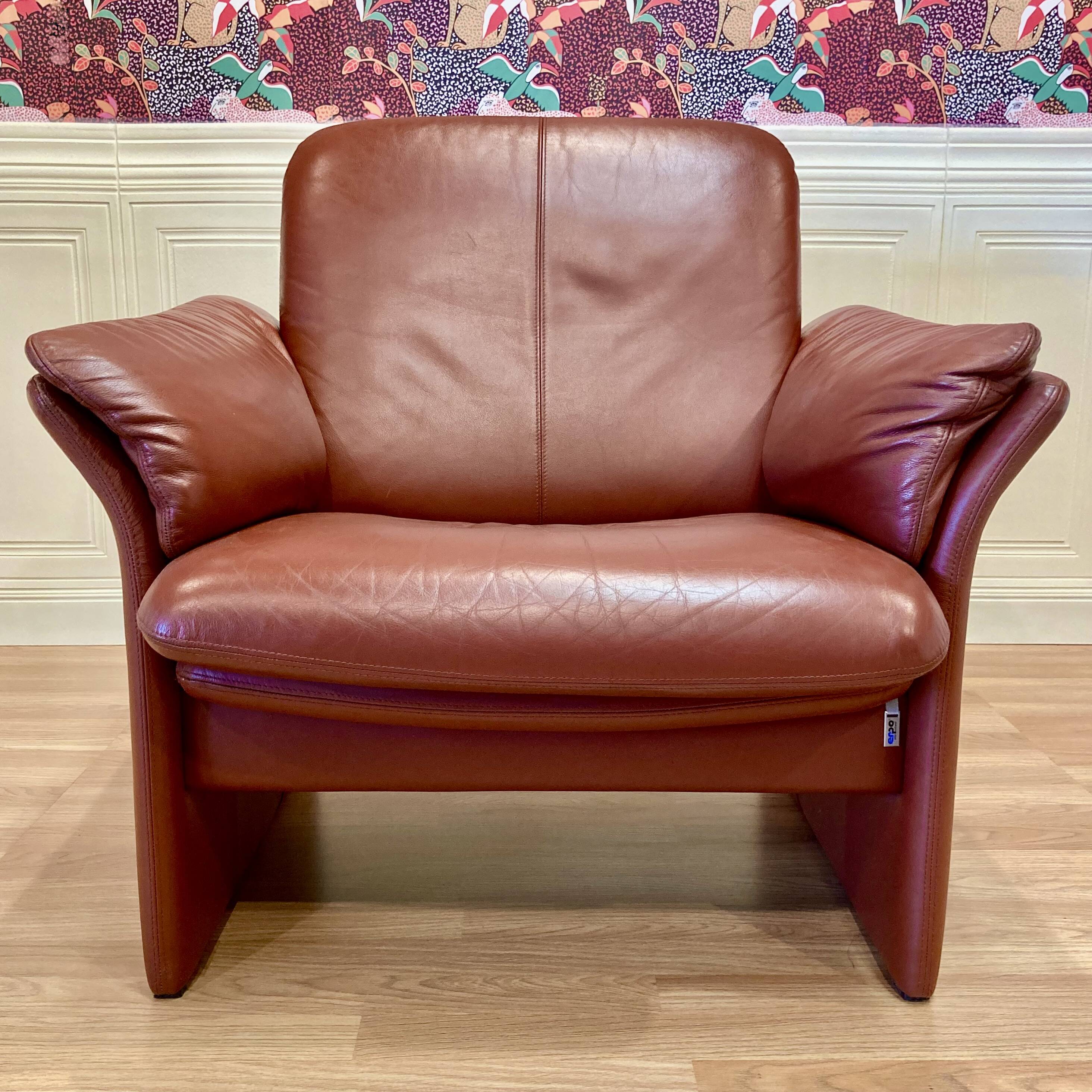 Pair of "Erpo" designer adjustable leather armchairs.