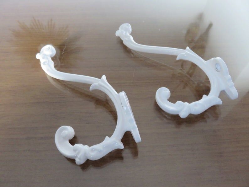 2 white cast iron pads art deco 30s 40s