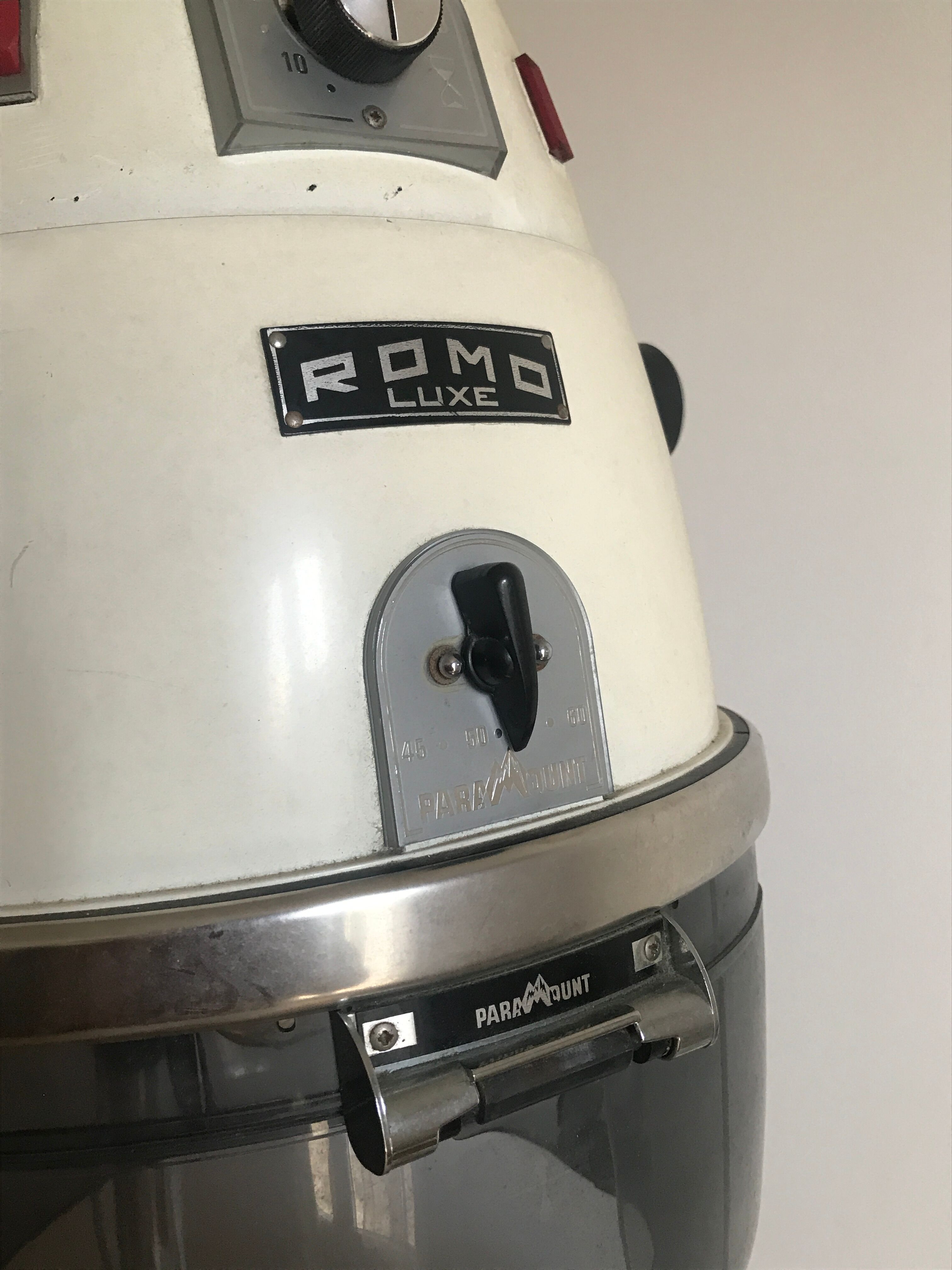 Vintage hairdresser's armchair with helmet transformed into a lamp